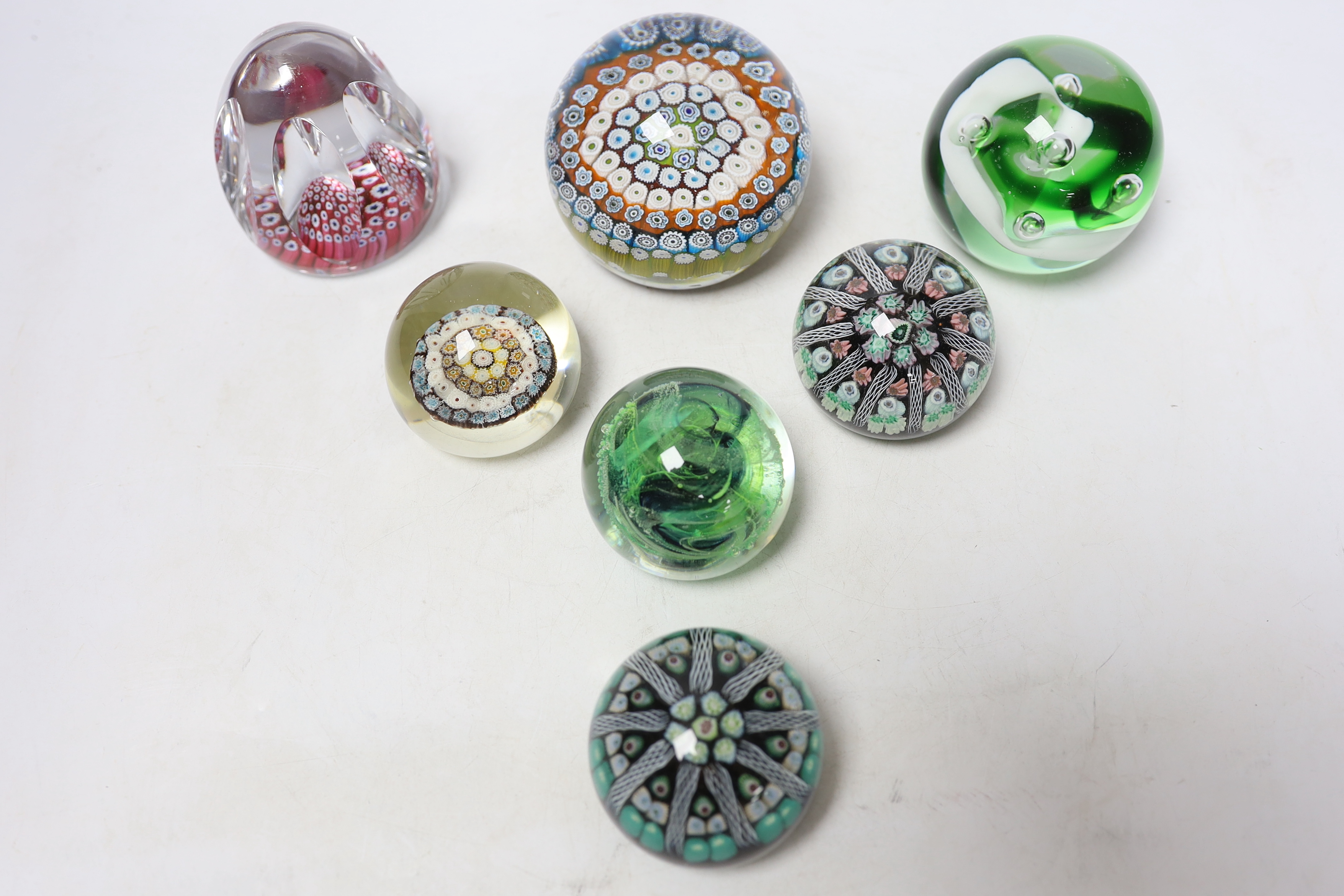 Seven Whitefriars and other paperweights, largest 8cm wide